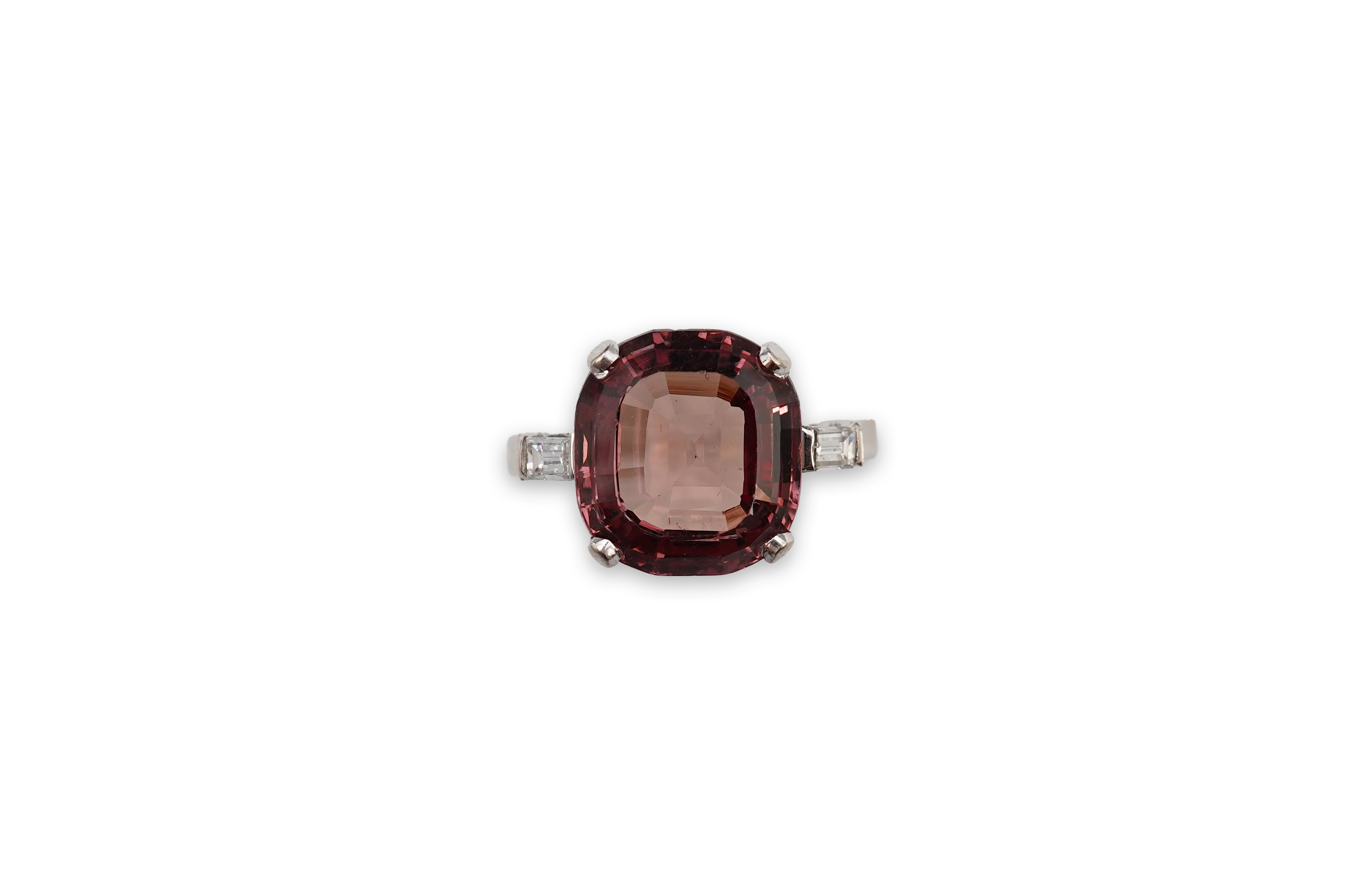 A garnet and diamond ring